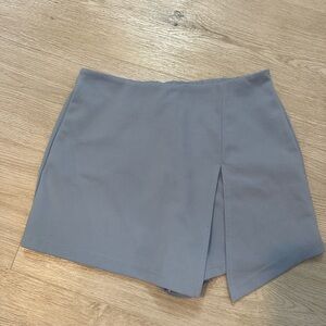 Light blue skort with cut out in front. Size small never worn